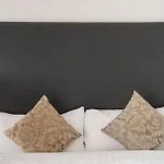 Escala Hotel & Suites